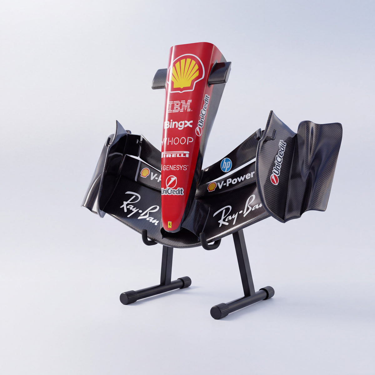 Three quarter view of a gloss carbon-effect Ferrari-inspired front wing sculpture on its floor stand