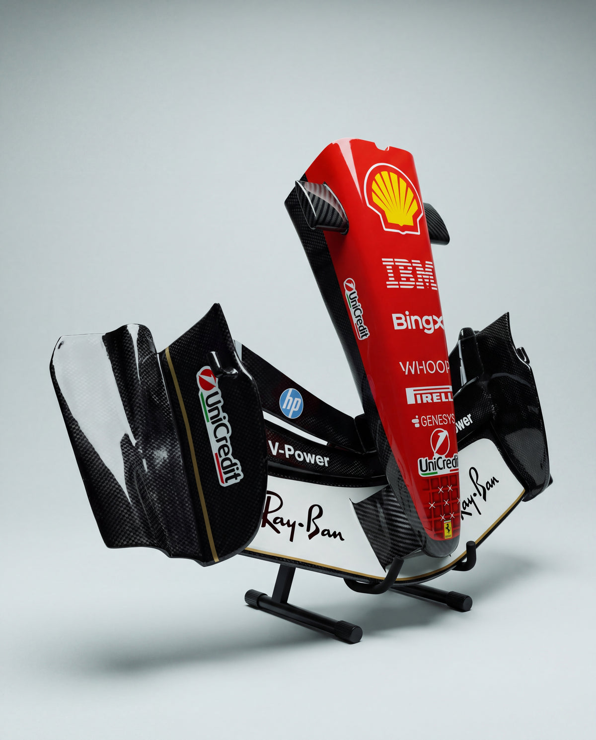 Ferrari-inspired Monza front wing sculpture with red nose, three quarter view on black stand