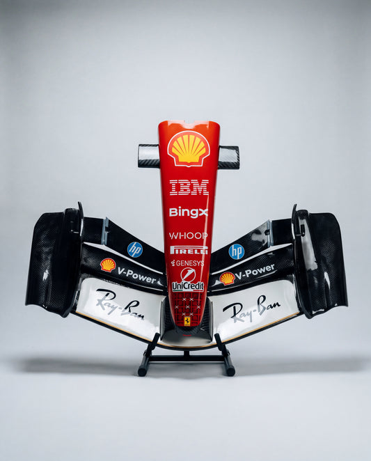 Ferrari-inspired Monza front wing sculpture head on, gloss carbon-effect wings on a black stand