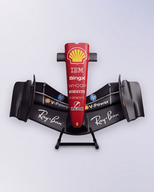Ferrari-inspired front wing sculpture in matte black, viewed head on with red sponsor nose