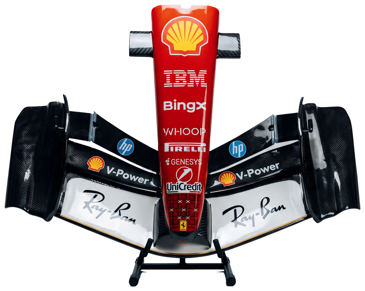 B Motorsports 2026 front wing, head-on, on the matte black floor stand