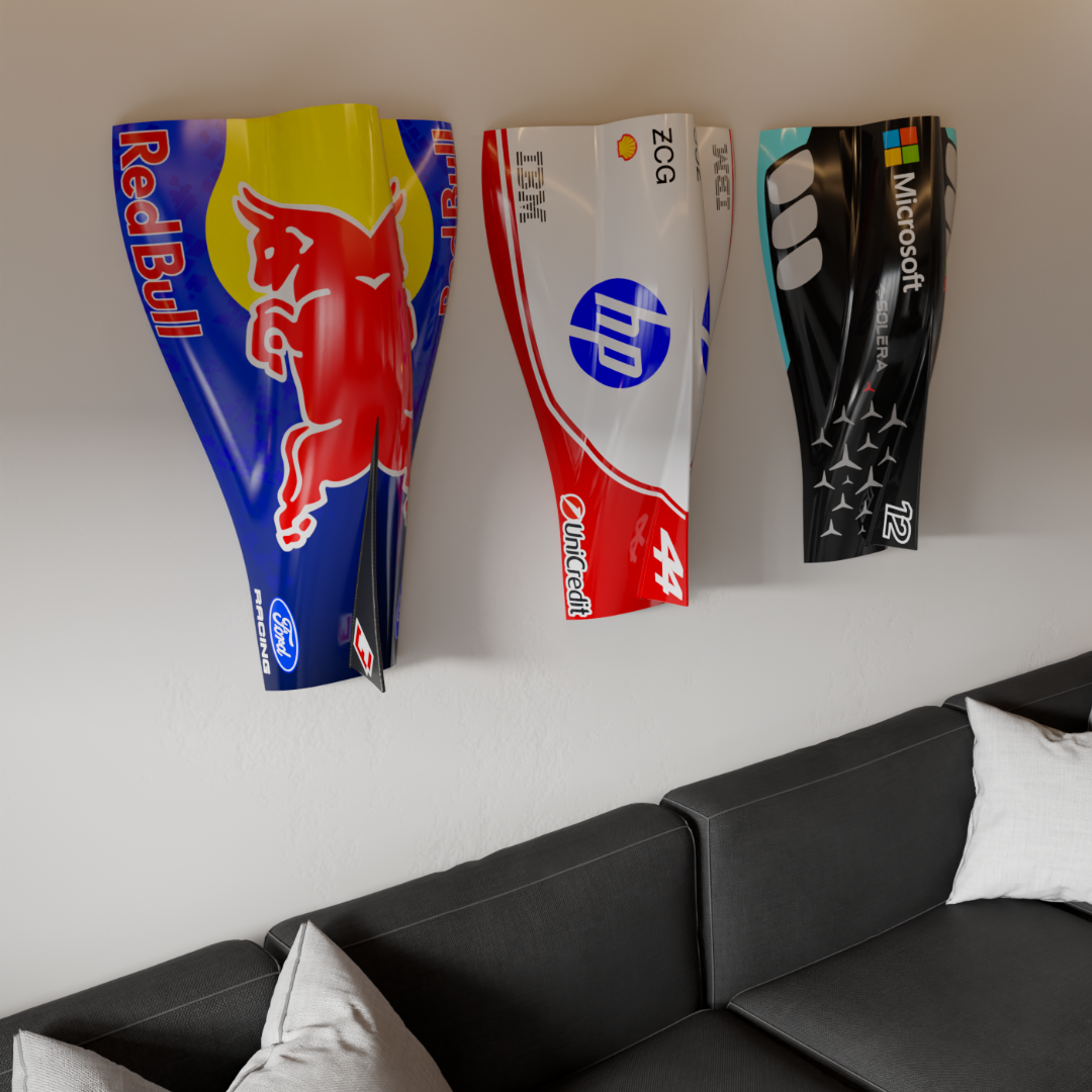 Side angle of three engine cover wall pieces, Mercedes-inspired black and teal at right